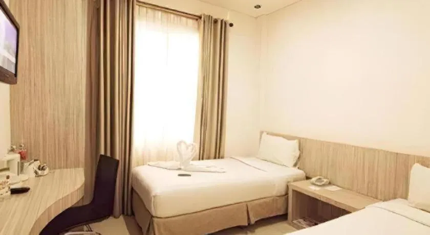 Bed in HW Hotel Padang