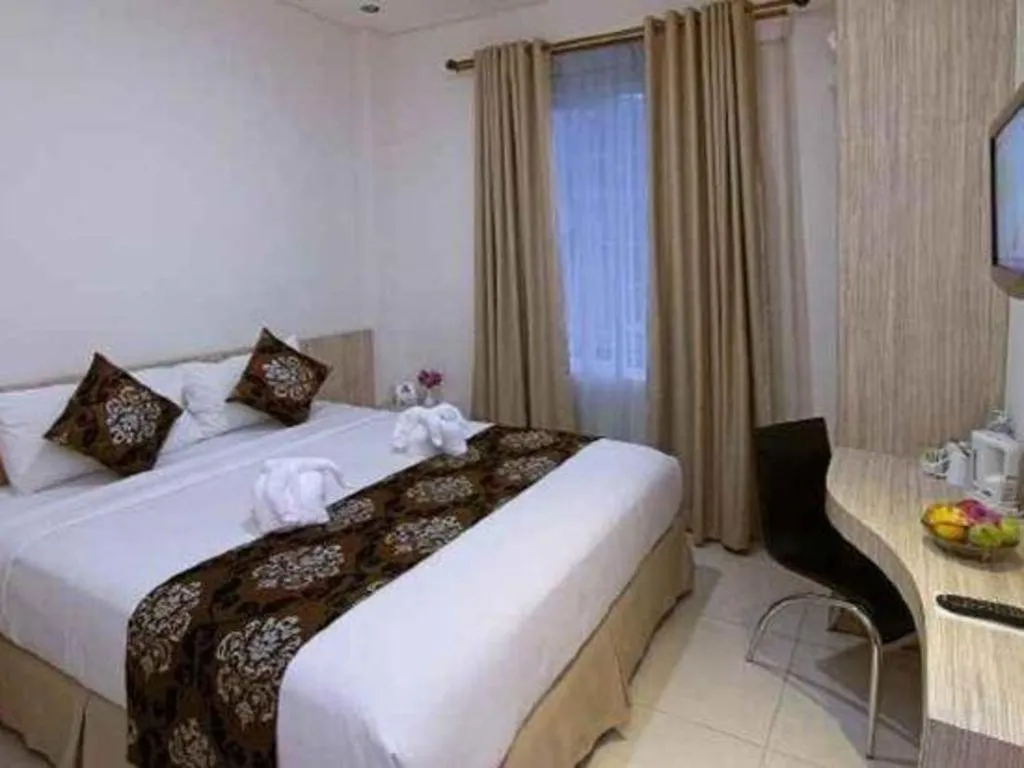 Bed in HW Hotel Padang