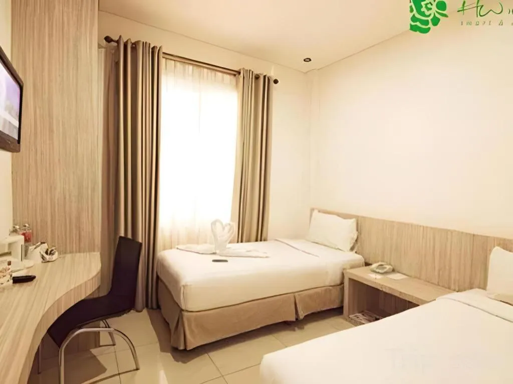 Bed in HW Hotel Padang