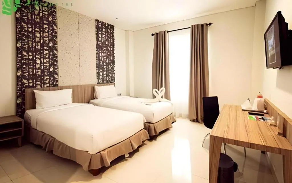 Bed in HW Hotel Padang