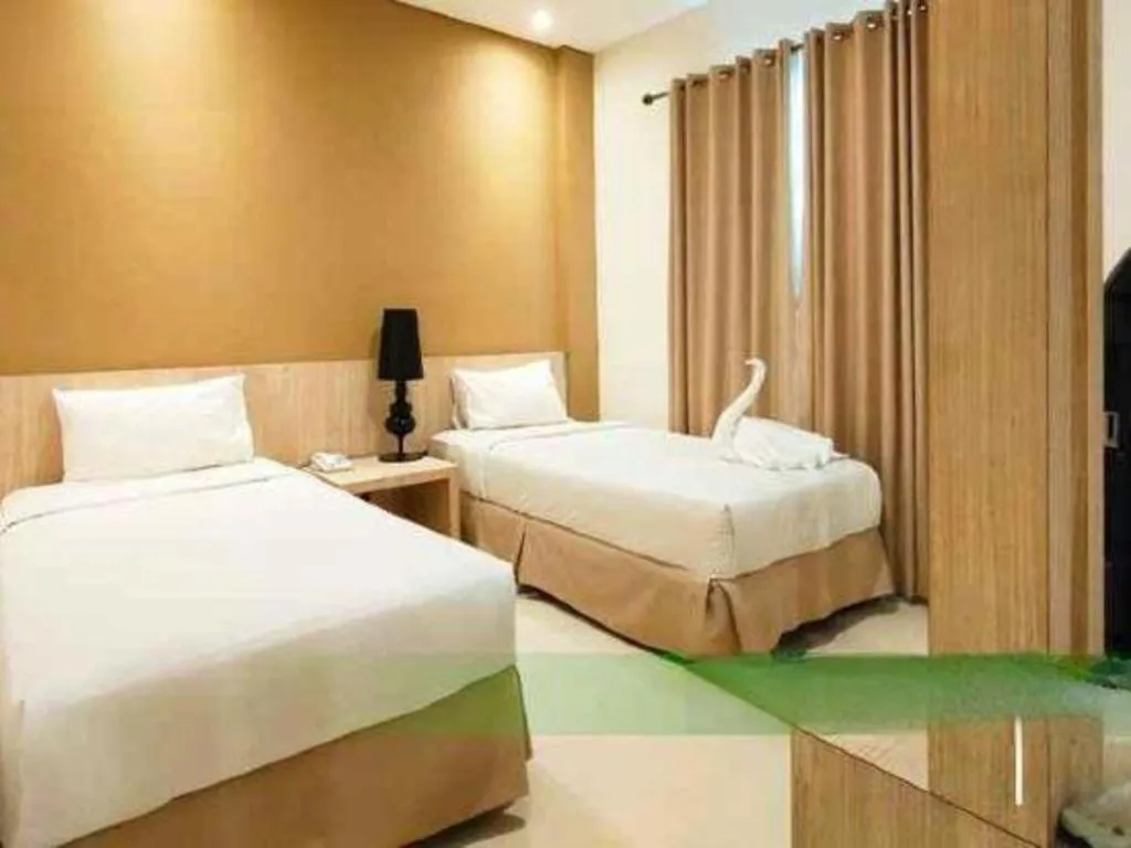 Bed in HW Hotel Padang