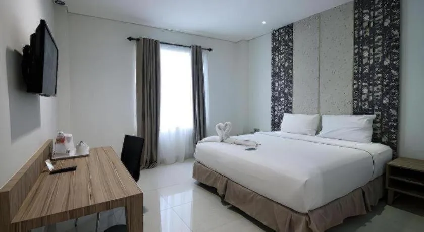 Bed in HW Hotel Padang