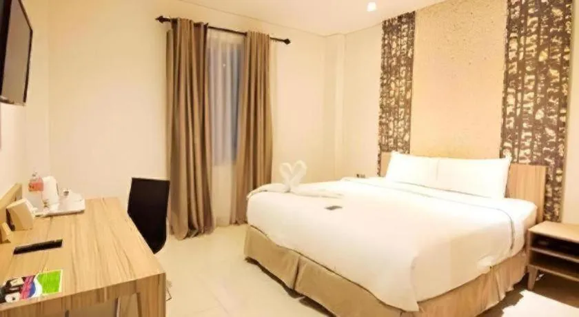 Bed in HW Hotel Padang