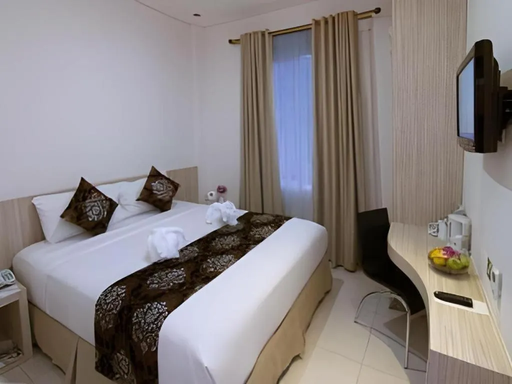 Bed in HW Hotel Padang