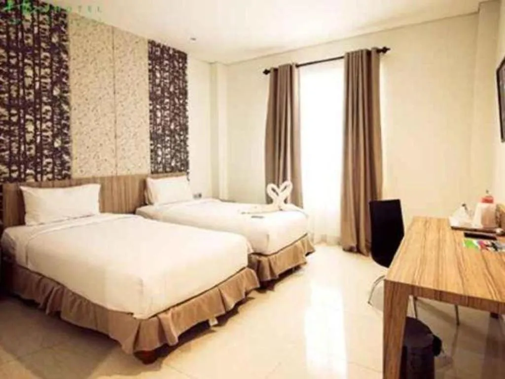 Bed in HW Hotel Padang