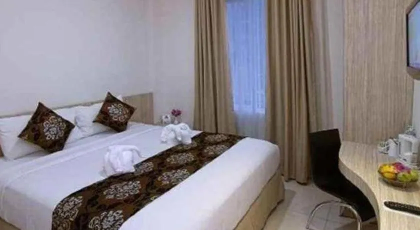 Bed in HW Hotel Padang