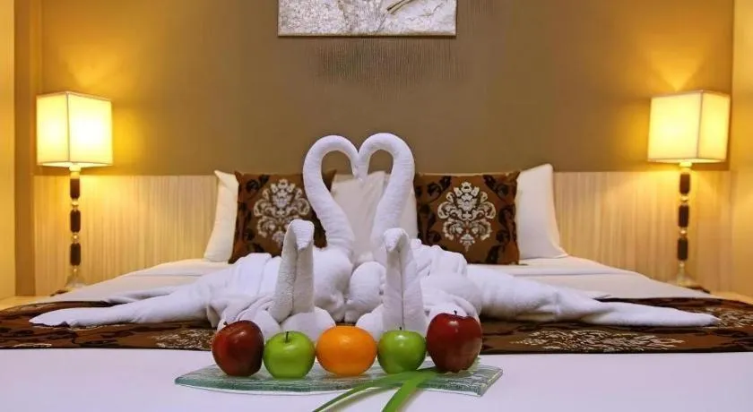 Bed in HW Hotel Padang