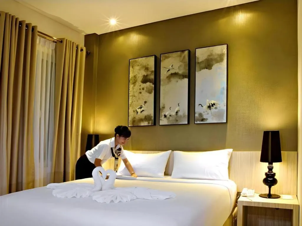 Bed in HW Hotel Padang