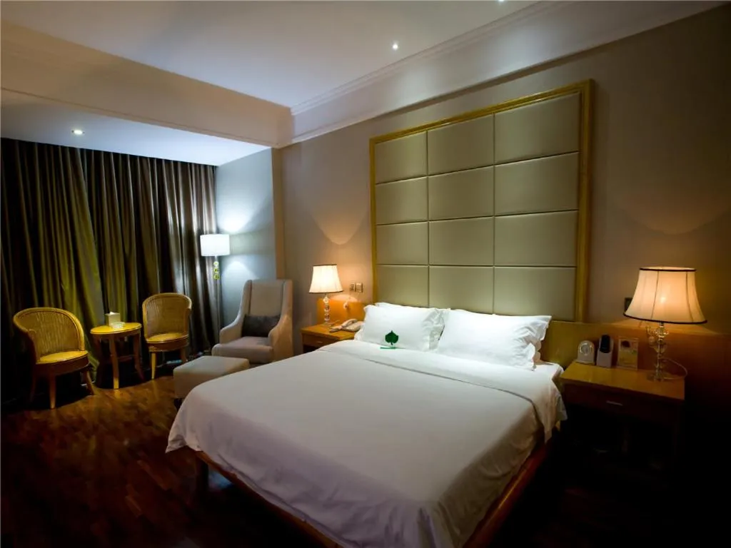 Bed in San Jiang Grand Hotel