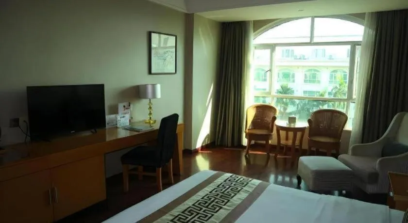 Bed in San Jiang Grand Hotel