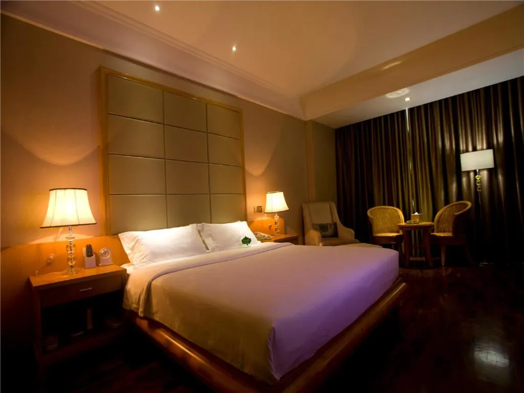 Bed in San Jiang Grand Hotel