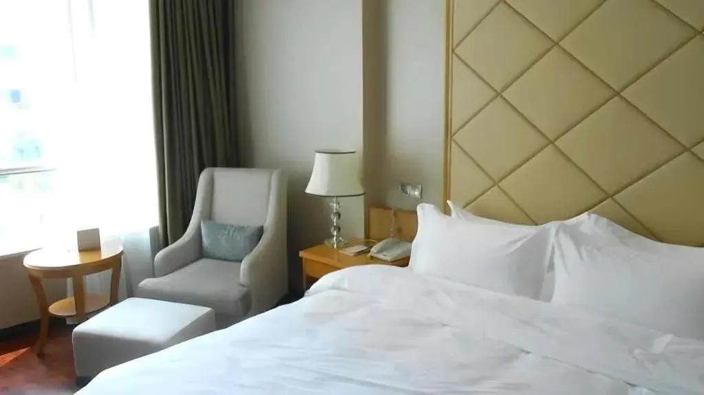 Bed in San Jiang Grand Hotel Bed in San Jiang Grand Hotel