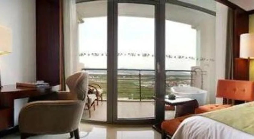 Bed in Grand Soluxe Hotel and Resort Sanya