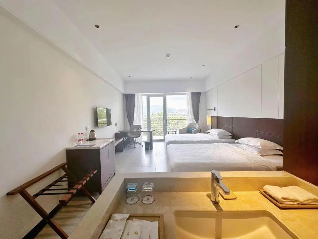 Bed in Grand Soluxe Hotel and Resort Sanya