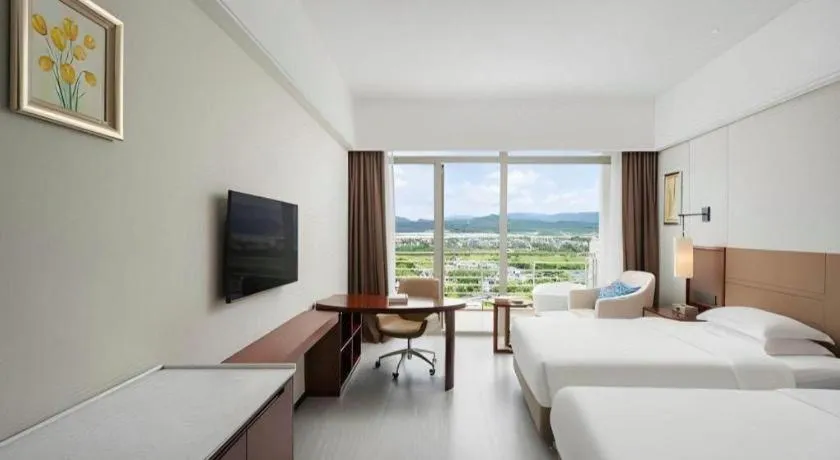 Bed in Grand Soluxe Hotel and Resort Sanya