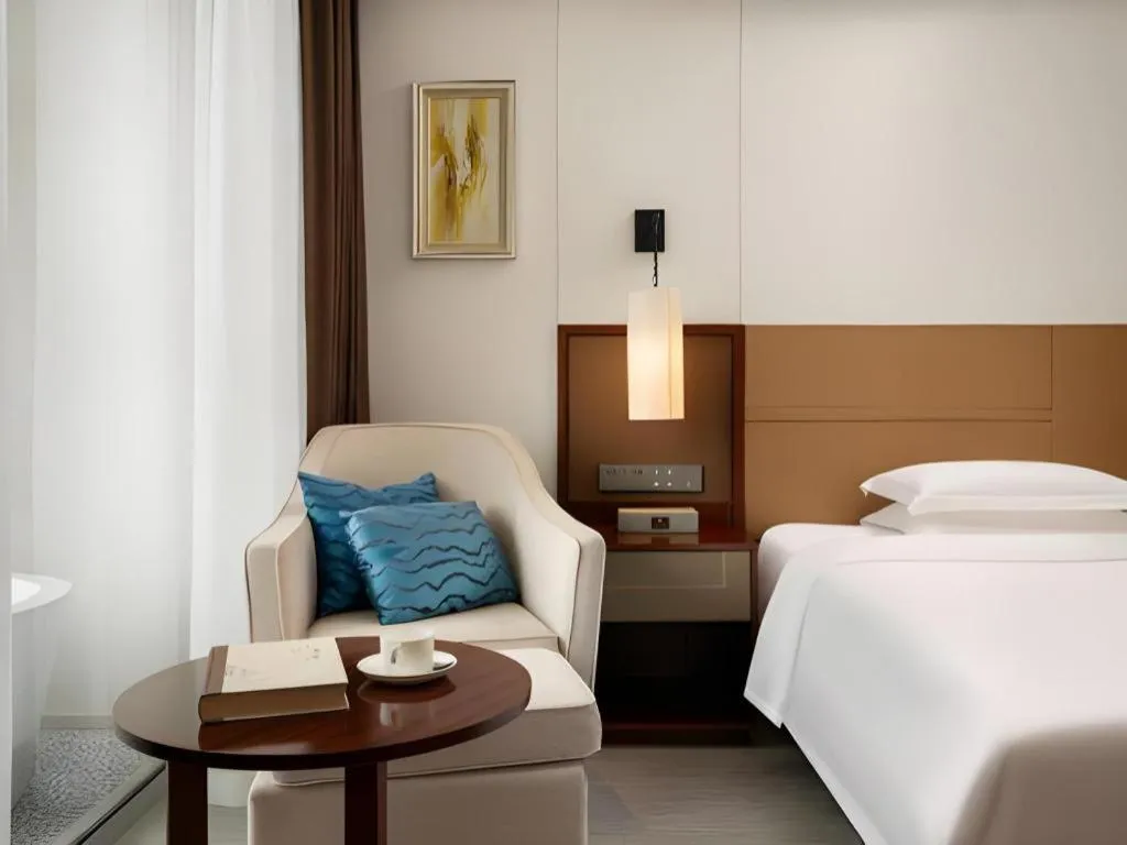 Bed in Grand Soluxe Hotel and Resort Sanya