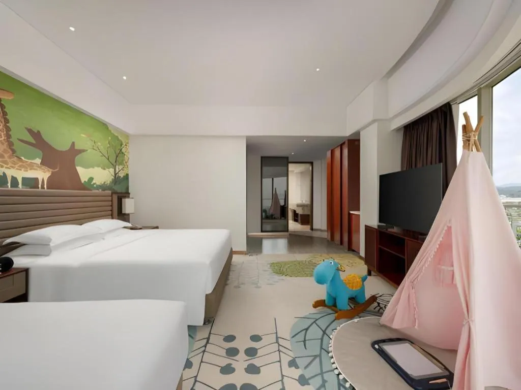 Bed in Grand Soluxe Hotel and Resort Sanya