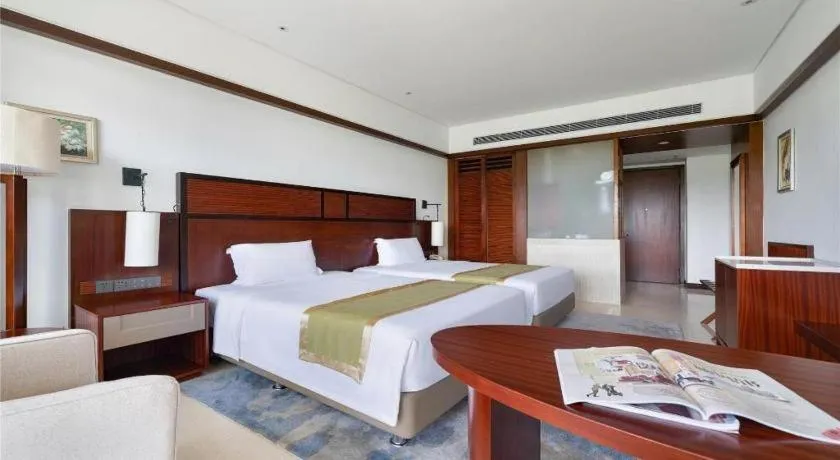 Bed in Grand Soluxe Hotel and Resort Sanya