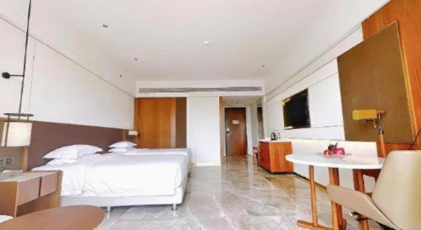 Bed in Grand Soluxe Hotel and Resort Sanya