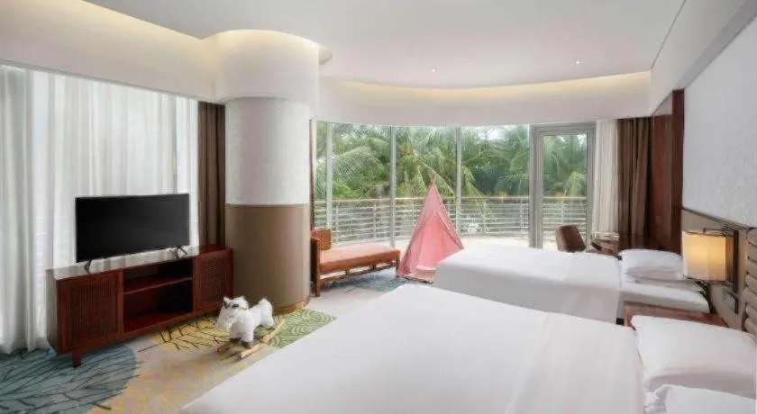 Bed in Grand Soluxe Hotel and Resort Sanya