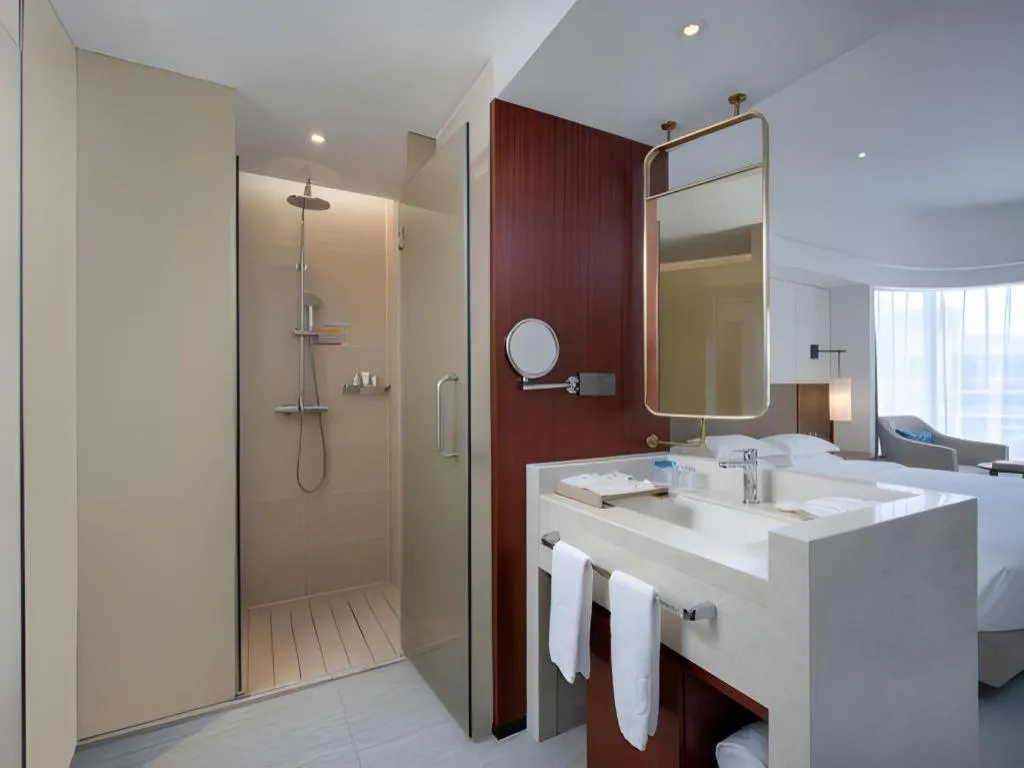 Bed in Grand Soluxe Hotel and Resort Sanya