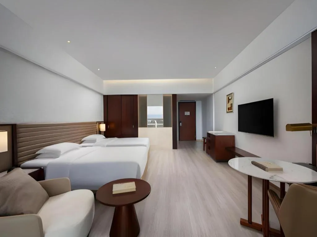 Bed in Grand Soluxe Hotel and Resort Sanya