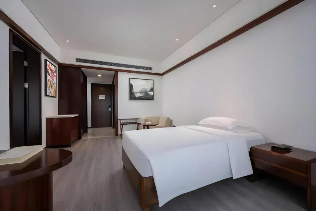 Bed in Grand Soluxe Hotel and Resort Sanya