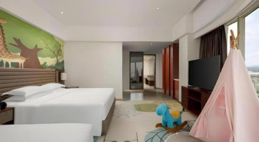 Bed in Grand Soluxe Hotel and Resort Sanya