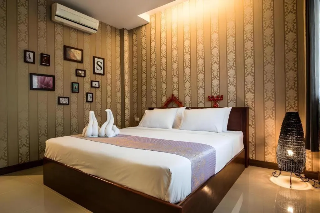 Bed in Sunday J Resort & Restaurant