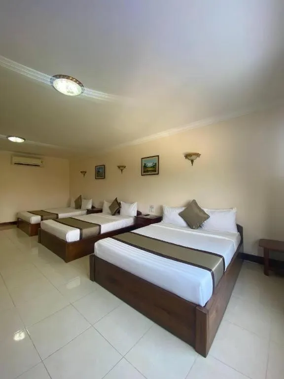Bed in Asian Koh Kong Hotel