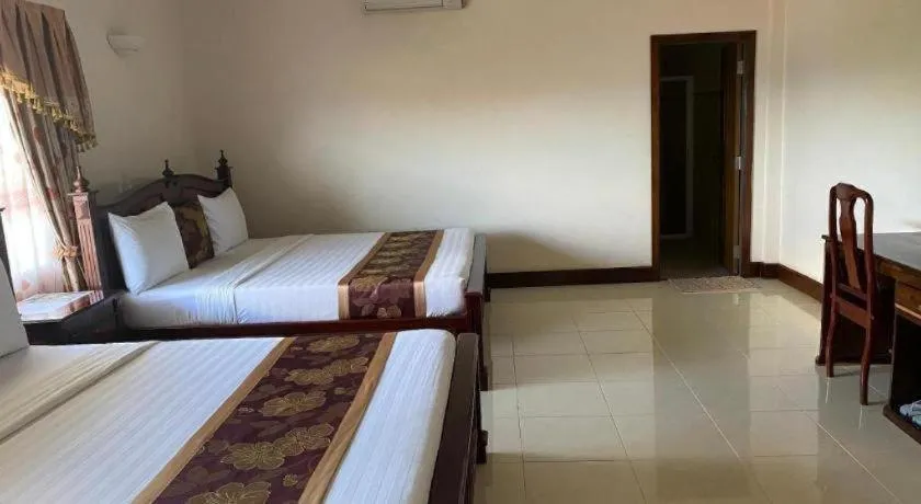 Bed in Asian Koh Kong Hotel