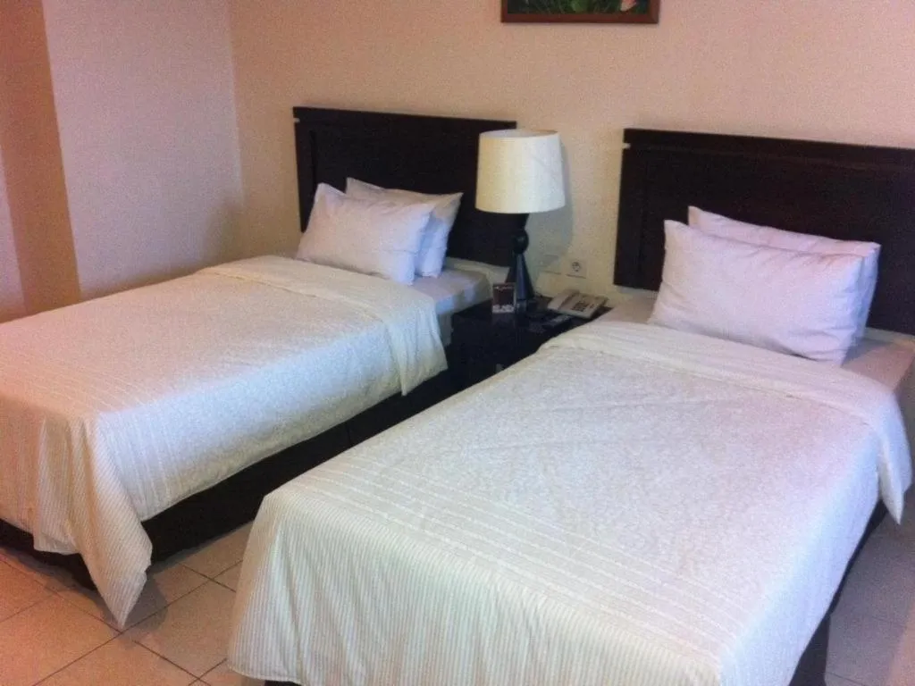 Bed in Guntur Hotel