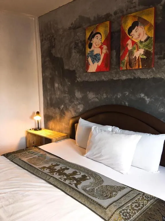 Bed in Sritrang Hotel