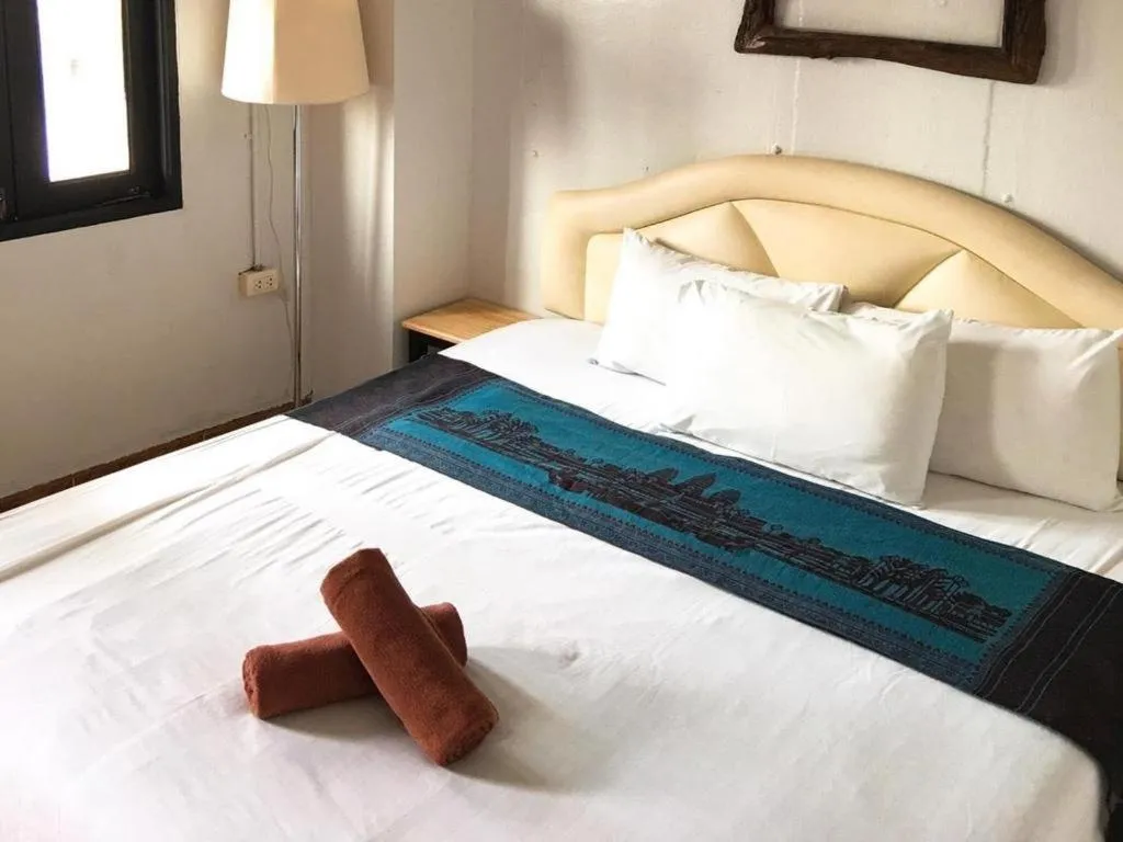 Bed in Sritrang Hotel