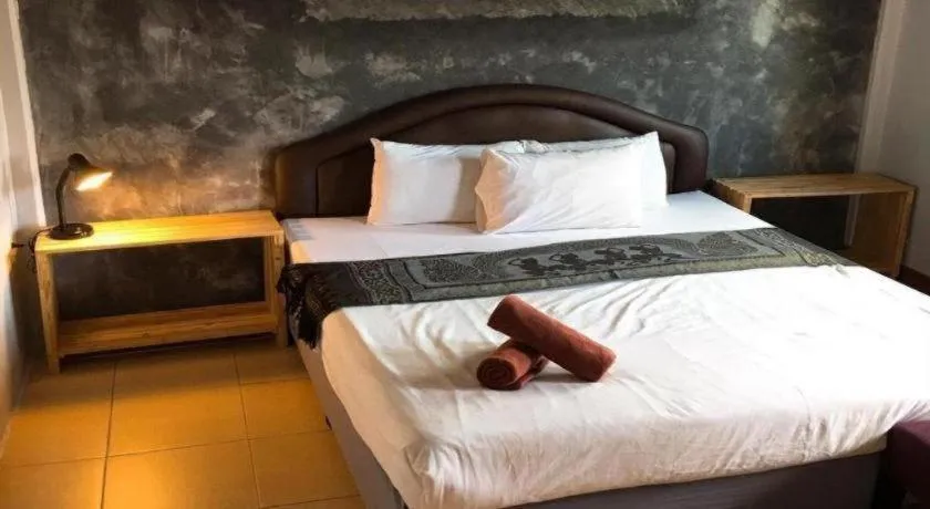 Bed in Sritrang Hotel
