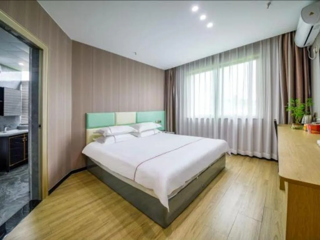 Bed in Yiwu Bairui Grand Hotel