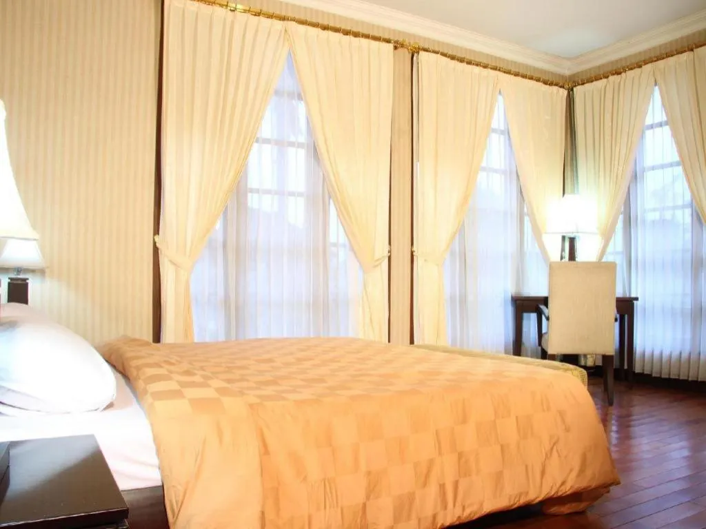 Bed in Campago Resort Hotel