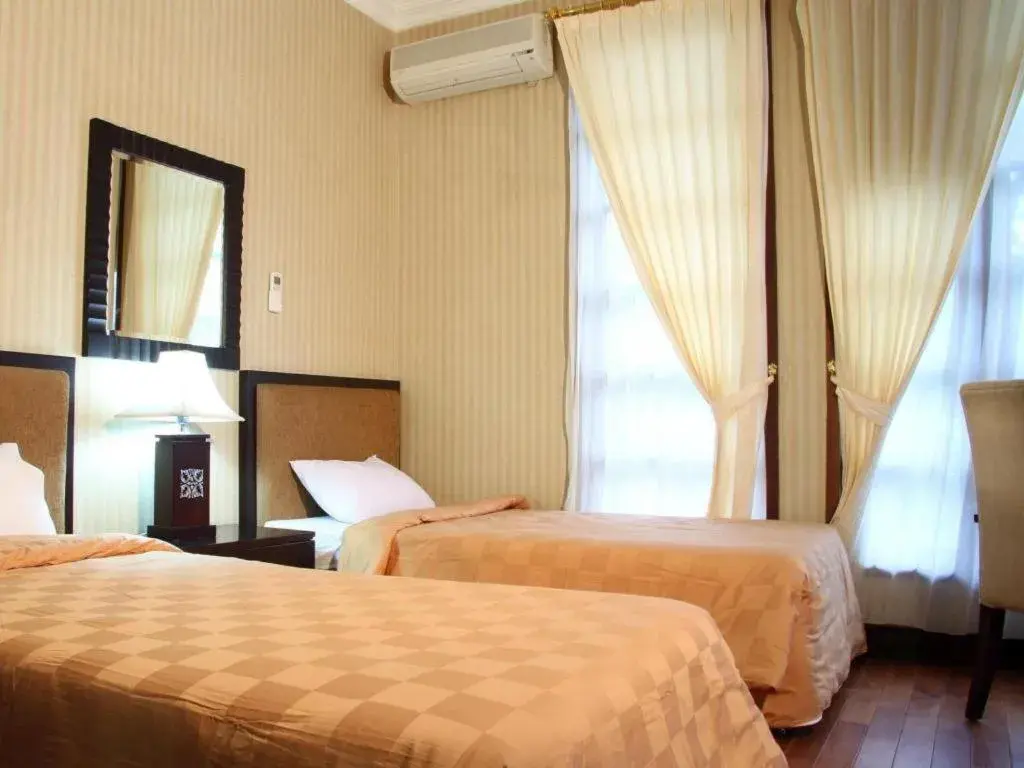 Bed in Campago Resort Hotel Bed in Campago Resort Hotel