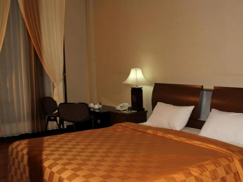 Bed in Campago Resort Hotel