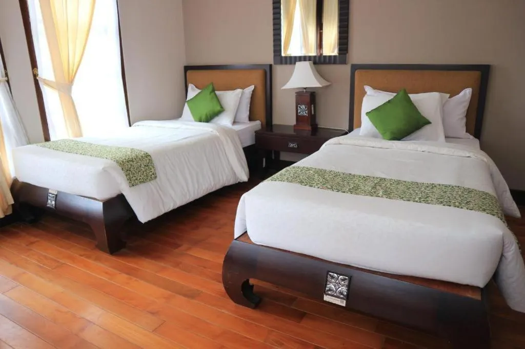 Bed in Campago Resort Hotel