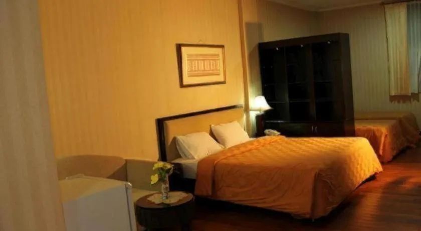 Bed in Campago Resort Hotel