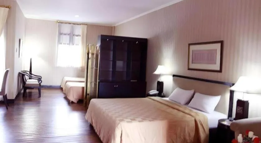 Bed in Campago Resort Hotel