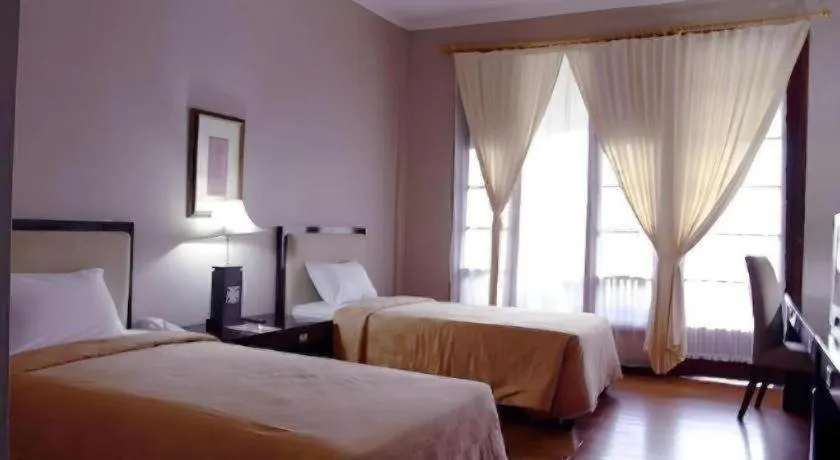 Bed in Campago Resort Hotel