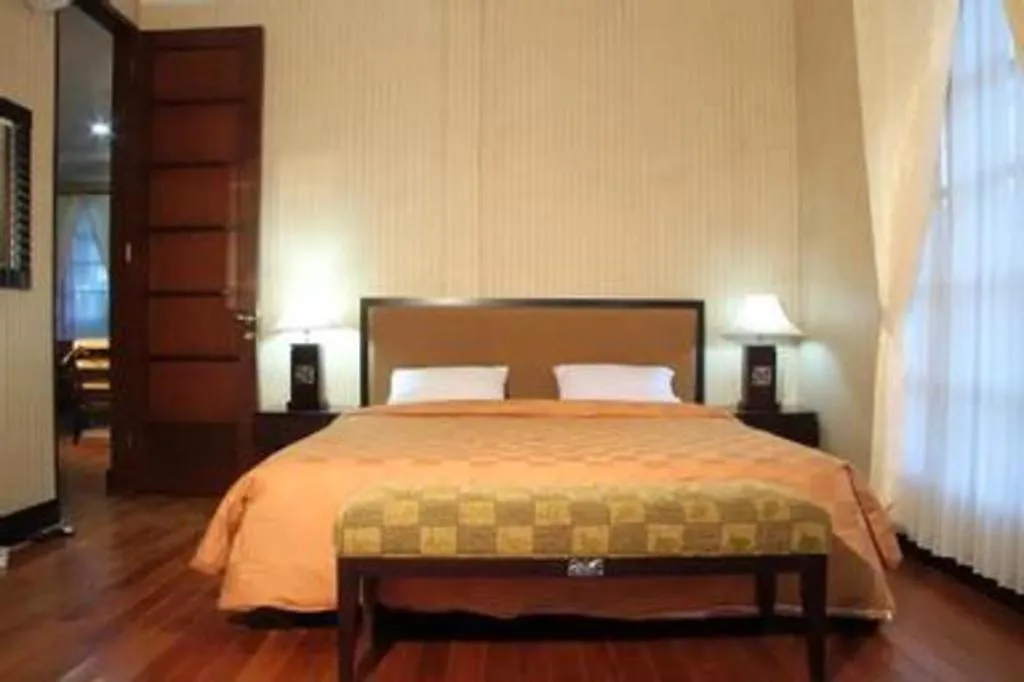 Bed in Campago Resort Hotel