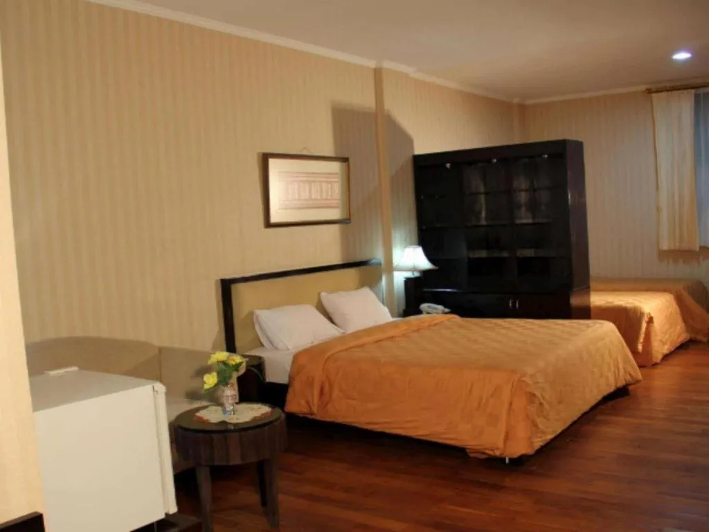 Bed in Campago Resort Hotel