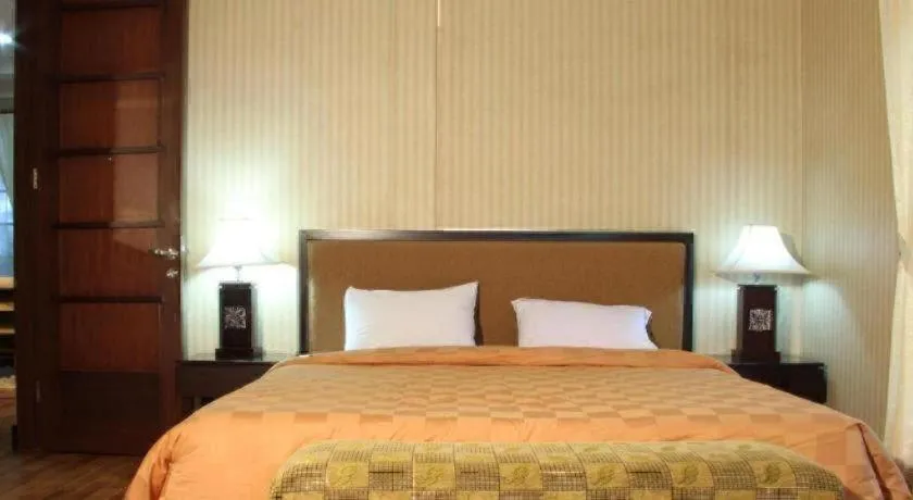 Bed in Campago Resort Hotel