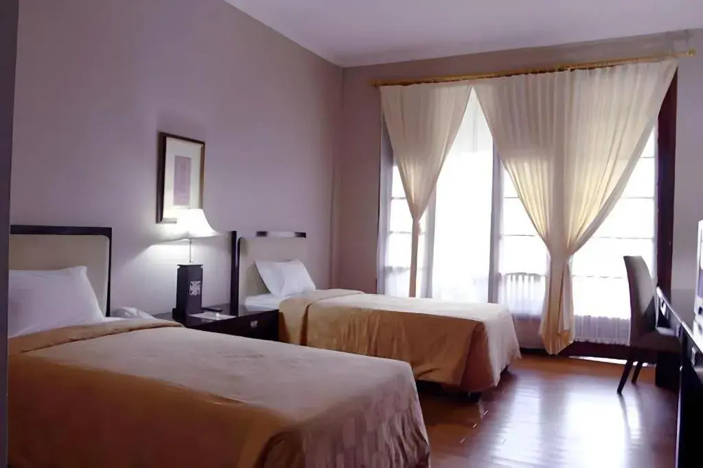 Bed in Campago Resort Hotel Bed in Campago Resort Hotel