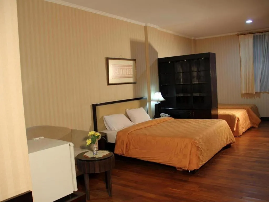 Bed in Campago Resort Hotel