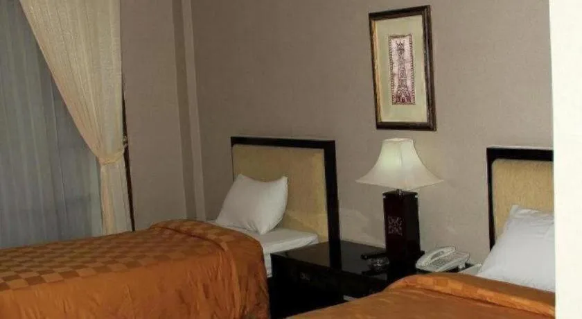 Bed in Campago Resort Hotel