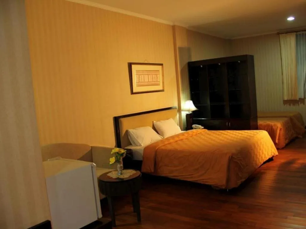 Bed in Campago Resort Hotel